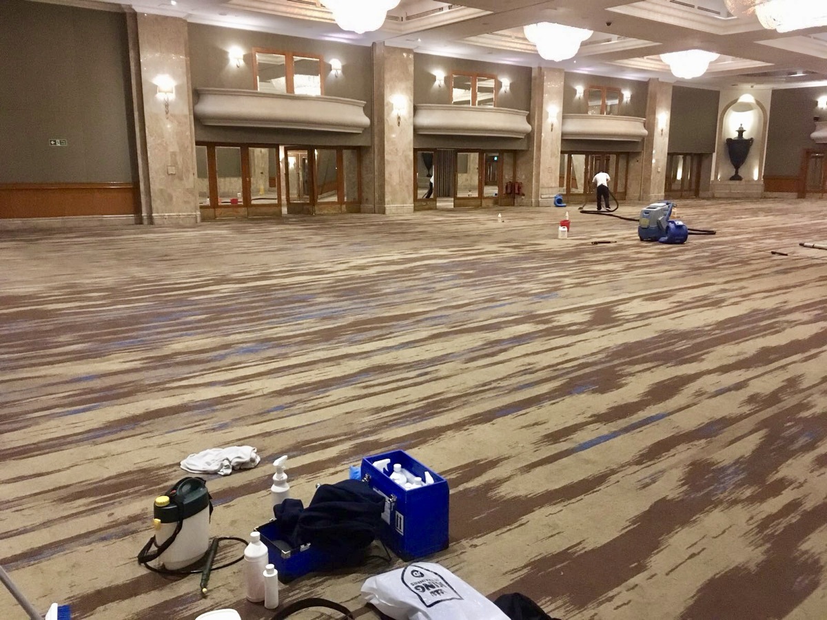 Cleaning the grand ballroom carpet at the Hilton on Park Lane