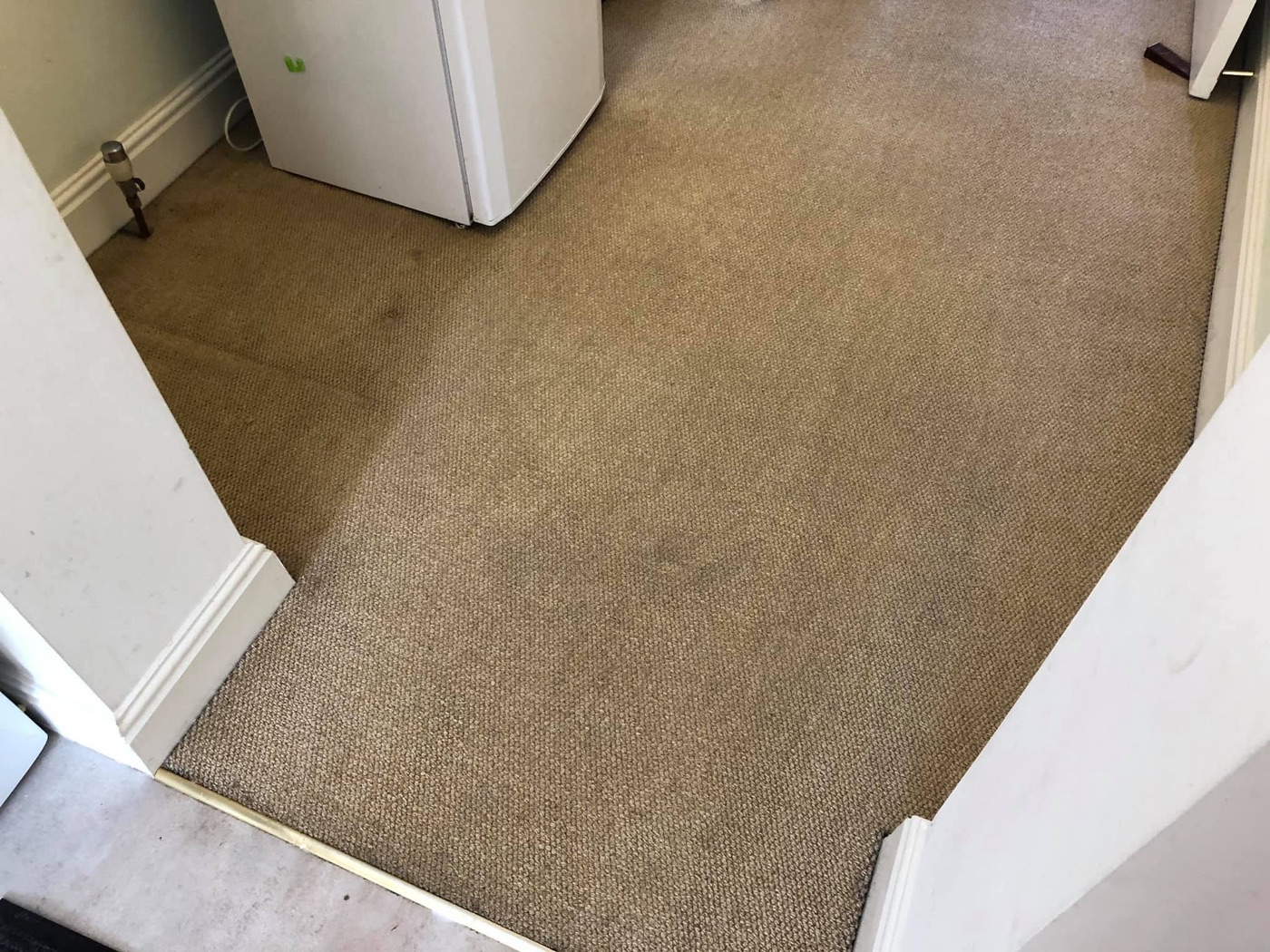 A badly soiled carpet brought back to life by Jay's Cleaning — fresh and clean