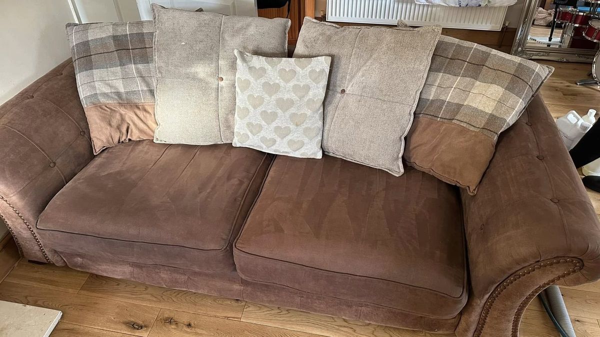 A brown suede sofa after deep cleaning by Jay's Cleaning